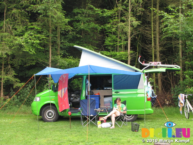 SX14975 Jenni reading at campervan